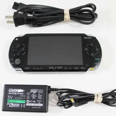 Pre-owned PSP original with 64GB full of Digital Offline Games